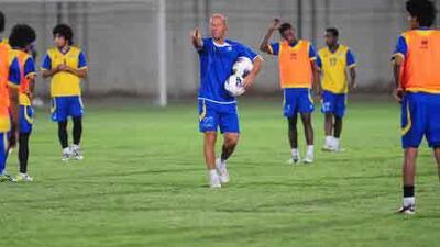 Baniyas coach Gabriel Calderon oversees training in Iran.