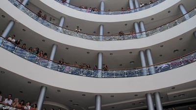 Syrians admire the new US$50 million (Dh183 million) Tartus Mall in Tartus, Damascus, a pro-regime and Alawite minority sect stronghold to which president Bashar Al Assad belongs. AFP Photo