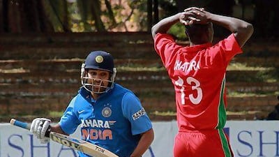 Rohit Sharma, left, scored an unbeaten 64 as India won the fourth ODI against Zimbabwe in Bulawayo on Thursday. Tsvangirayi Mukwazhi / AP Photo