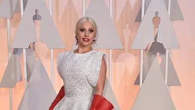 Lady Gaga’s Azzedine Alaia dress was fantastic despite the lobster red gloves — however, the custom-made design stood out as a perfect mix of high-fashion and red carpet. Jordan Strauss / Invision / AP