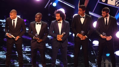 Left to right: PSG striker Kylian Mbappe, Chelsea midfielder N'Golo Kante, Real Madrid defender Marcelo, Real Madrid defender Raphael Varane and Manchester United goalkeeper David de Gea receive the FIFA FIFPro World Eleven awards. EPA