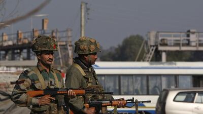 Indian army soldiers take positions outside the Indian airbase in Pathankot, 430 kilometres north of New Delhi on January 6. Channi Anand / AP