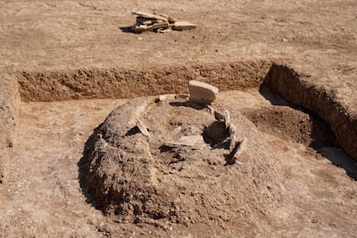 Ancient graves unearthed by members of the Dohuk Antiquities Department on the banks of Mosul Dam. AFP