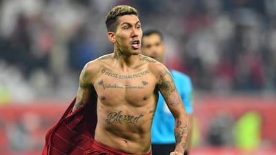 Firmino of Liverpool celebrates breaking the deadlock. EPA