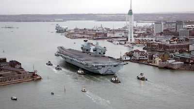 HMS Queen Elizabeth returns to Portsmouth Naval Base last December after her global seven-month deployment to the Indo-Pacific. PA