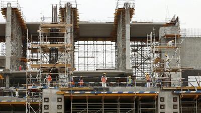 Labourers work at a construction site in Dubai. Ahmed Jadallah / Reuters