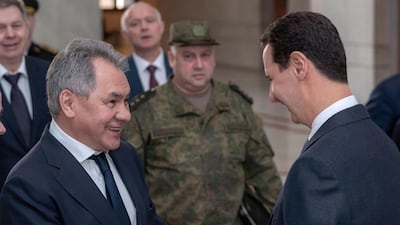 epa07448916 A handout photo made available by the official Syrian Arab News Agency (SANA) shows Syrian President Bashar Assad (R) receiving Russian Defense Minister Sergey Shoygu (L), Damascus, Syria, 19 March 2019. According to SANA, Assad said the Russian-Syrian coordination, especially in the military and political domains, were one of the decisive factors of Syrias steadfastness in the face of terrorism. EPA/SANA HANDOUT HANDOUT EDITORIAL USE ONLY/NO SALES