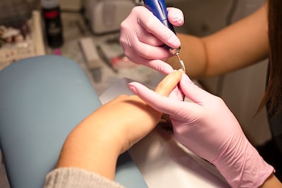 Constantly wearing gel or acrylic nails can adversely affect nail health due to the chemicals, UV light curing and removal. Getty Images