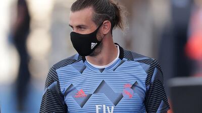 Gareth Bale walks to the bench during the Liga match. Getty