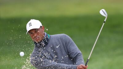 Tiger Woods plays a shot from the bunker during a practice round prior to the 2020 PGA Championship at TPC Harding Park. AFP