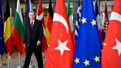 Turkish President Erdogan arrives before a meeting with European Commission President and EU Council President at the EU headquarters in Brussels. AFP