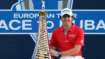 Rory McIlroy with his Race to Dubai trophy after winning the DP World Tour Championship