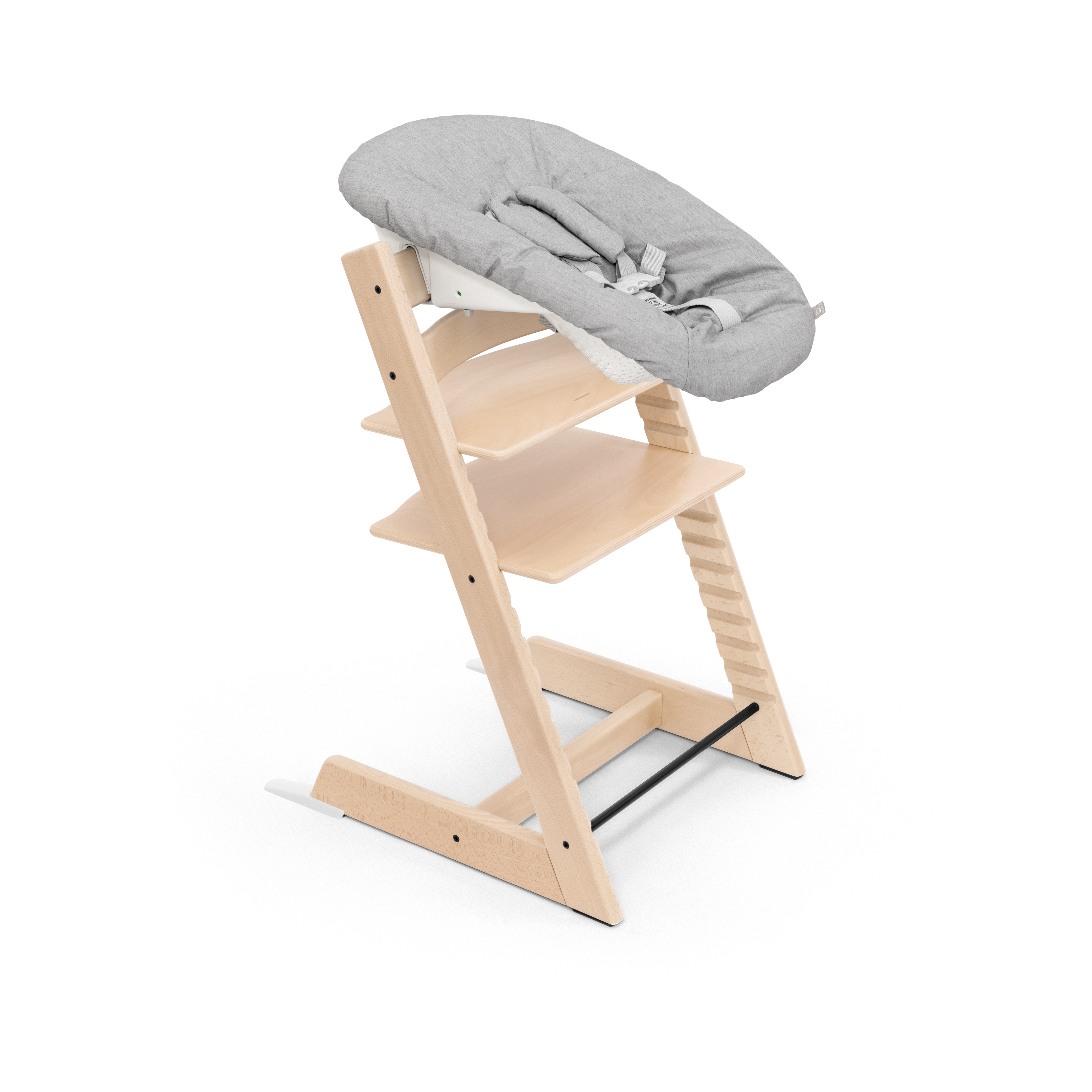 Stokke's TrippTrapp high chair with a newborn insert can be used from birth until childhood, and also functions as a chair for adults. Photo: Stokke
