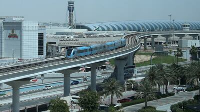 The lifeline of the city, Dubai Metro connects to Terminals 1 and 3 of the Dubai International Airport. Pawan Singh / The National