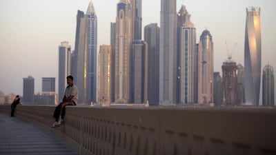 Dubai’s economy is booming, the property market has recovered and the emirate has embarked on another round of debt-fuelled expansion. Sarah Dea / The National