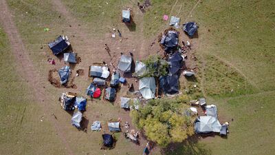 Hundreds of migrants, including children, babies and elderly people, set up improvised camps in northwest Bosnia.