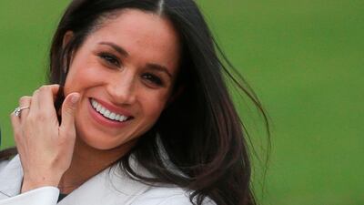 US actress Meghan Markle shows off her engagement ring. Daniel Leal-Olivas / AFP Photo
