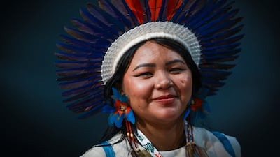An indigenous woman participates in the People's Summit at the Cop30 climate conference in Belem, Brazil. EPA