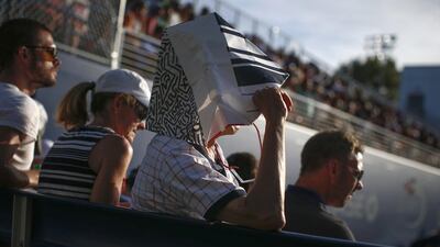 People watch a match at one of the side courts at the 2014 US. Shannon Stapleton / Reuters / August 29, 2014