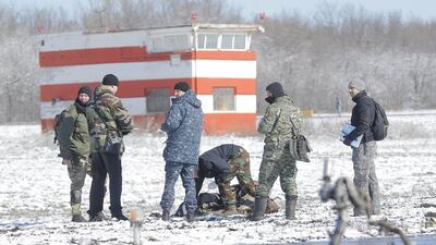 Emergencies Ministry members work at the crash site of Boeing 737-800 Flight FZ981, operated by Dubai-based budget carrier Flydubai, at the airport of Rostov-On-Don, Russia on Sunday. Maxim Shemetov /