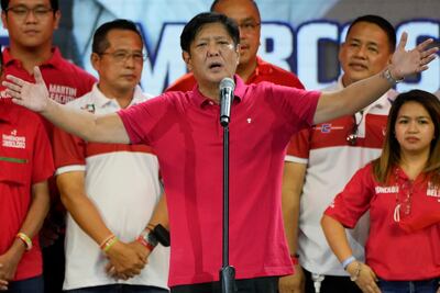 Presidential candidate Ferdinand "Bongbong" Marcos Jr greets the crowd during a campaign rally in Quezon City, Philippines, in April. AP