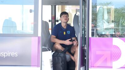 England's Harry Maguire waits on a coach outside the Souq Al Wakra hotel. PA