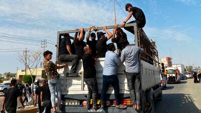 Shiite Muslim worshippers leave after the end of the Arbaeen Shiite festival, in Karbala, Iraq. AP