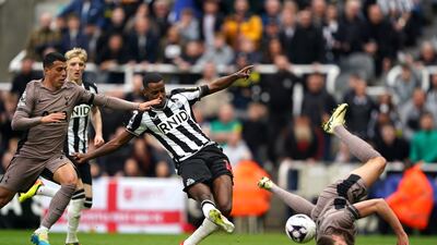 Newcastle United's Alexander Isak scores their first goal. PA
