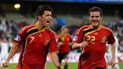 David Villa, left, has moved into second place in Spain's list of all-time goalscorers after his effort against Iraq in Bloemfontein.