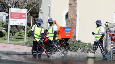 The clean-up operation was in full swing in Dubai on Sunday after the storm. All photos: Pawan Singh / The National