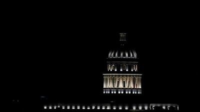 A view of the super moon over the dome of the National Capitol Building, in Havana, Cuba. EPA