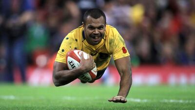 Australia's Kurtley Beale scores a try against Wales at the Principality Stadium in Cardiff. Australia won the match 29-21. Mike Egerton / AP Photo