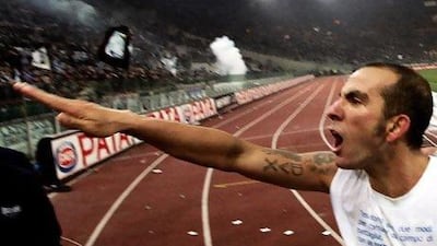 Paolo Di Canio using the "Roman salute" at the end of the Italian Serie A match between Lazio and city rivals Roma at Olympic stadium in Rome in 2005. Filippo Monteforte / EPA