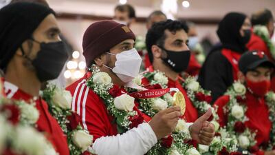 Abdulla Sultan Al Aryani alongside other members of the UAE Paralympics team.