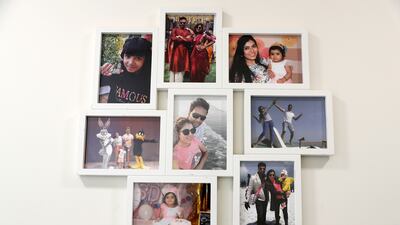 Family photos are displayed throughout the home