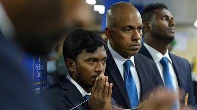 Charith Senanayake, centre, resigned as Sri Lanka manager following the first Test loss to England in Galle in November. AFP