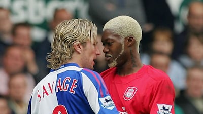 Djibril Cisse of Liverpool, right, against another hirsute lover, Robbie Savage of Blackburn. Getty