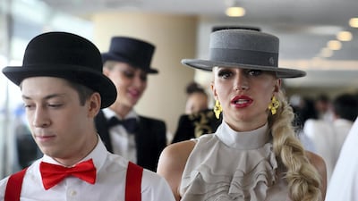 Men and women have gone all out to make sure they look fabulous today. Chris Whiteoak / The National