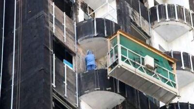 The balcony on which the fire is believed to have started was being used to store clothes and plastics.