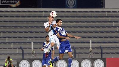 Carlos Munoz, centre in white, has not reported back for pre-season training for Baniyas. Jeffrey E Biteng / The National