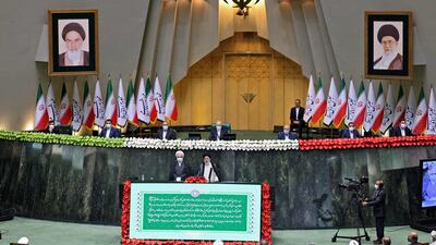 Iran's new President Ebrahim Raisi takes the oath at the parliament in the Islamic republic's capital Tehran.