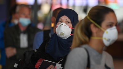 Passengers bound for Frankfurt wait at a terminal of Dubai International Airport.
