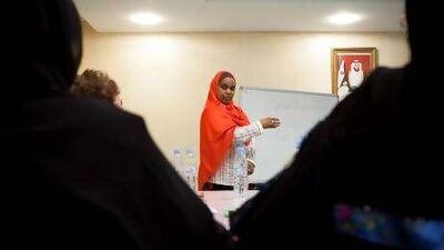 Salma al Khidir, a schools liaison officer, helps introduce teachers to the New School Model.