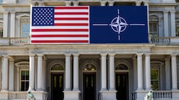 The US and Nato flags in Washington. Tension has risen between Washington and European allies amid disagreements over Greenland. Reuters