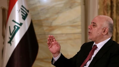 Iraq's prime minister Haider Al Abadi says he is prepared to intervene militarily if the Kurdish region's planned referendum results in violence. Khalid Mohammed / AP Photo