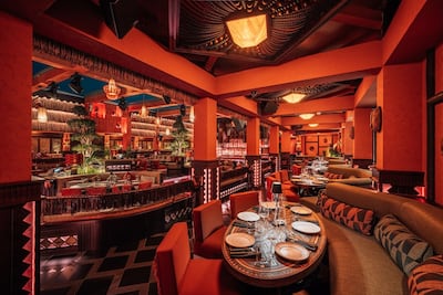 The restaurant has a theatre-like aesthetic. Photo: Ina