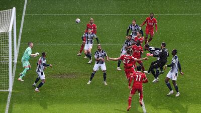 Liverpool goalkeeper Alisson Becker scores the injury-time winner against West Bromwich Albion in the Premier League game at The Hawthorns on Sunday, May 16. Reuters