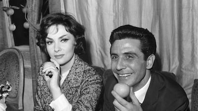 Lollobrigida and French singer Gilbert Becaud received the Prix Orange prize, awarded by a jury of journalists to the artists most co-operative with the press in 1959. AFP
