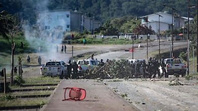 Smoke rises following unrest in Dumbea, New Caledonia, as anger over a controversial electoral reform bill lingers. It comes as independence activists linked to a group accused of orchestrating deadly riots last month in the French Pacific territory have been sent to mainland France for pre-trial detention. AFP