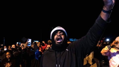 A large crowd marches down the interstate road in Memphis. AFP